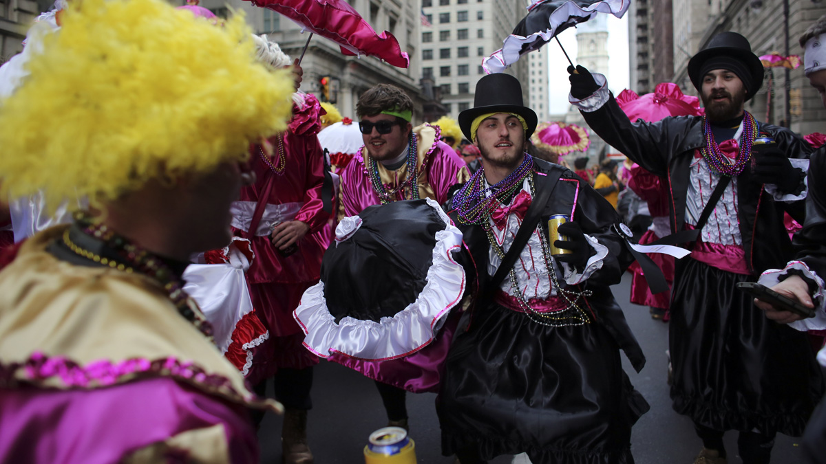  Members of the Two Street Stompers dance on South Broad Street during the 116th annual Mummers Parade in Philadelphia on Friday. (AP Photo/Joseph Kaczmarek) 