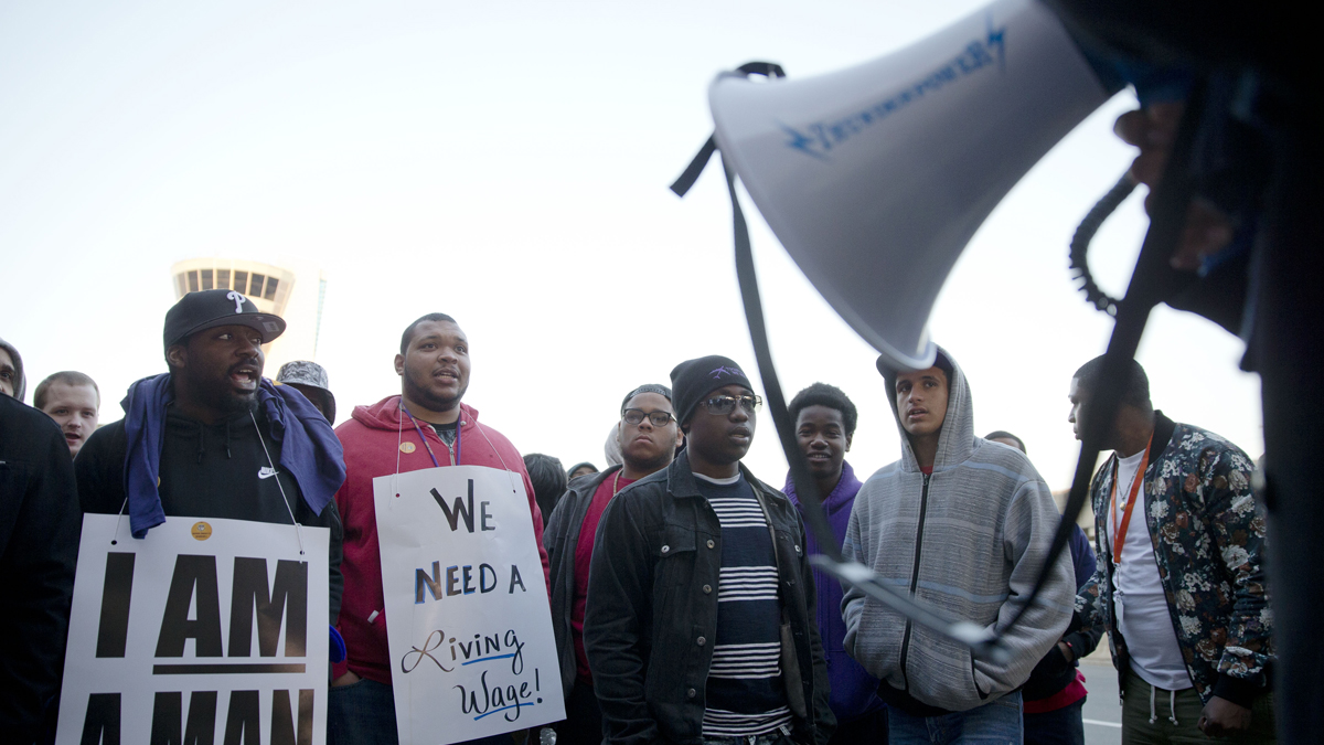  In this file photo, airport workers and their supporters picket, Thursday, April 2, 2015, at Philadelphia International Airport in Philadelphia.  (Matt Rourke/AP Photo, file) 