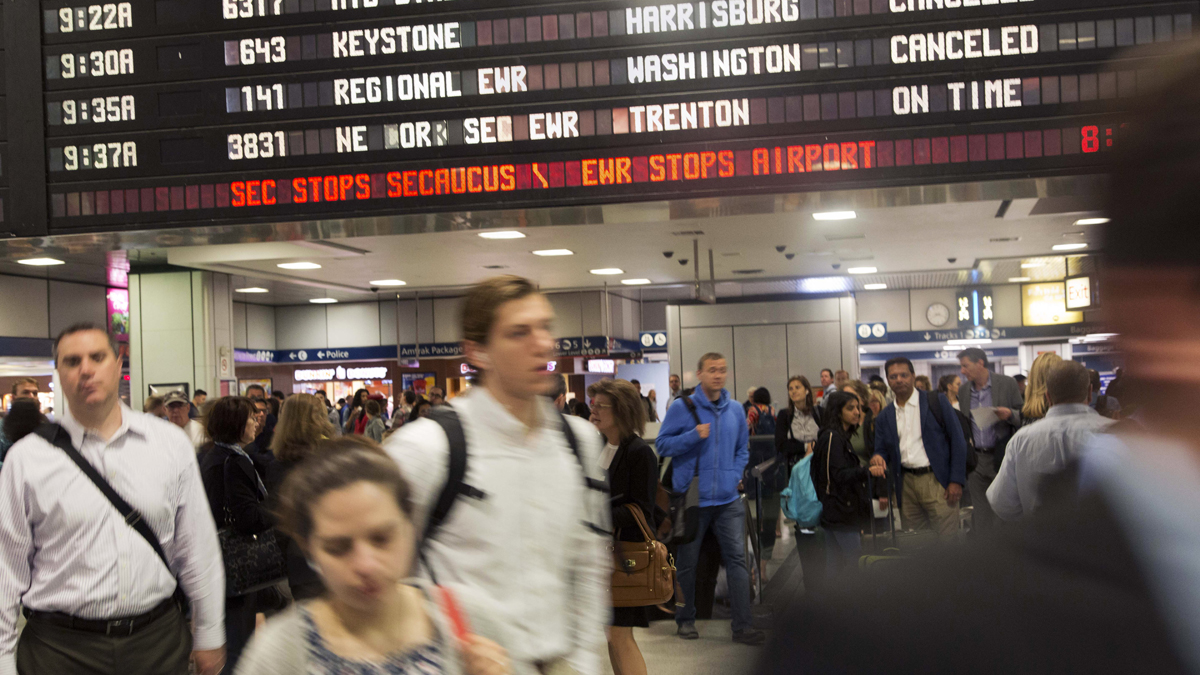  Travelers walk through New York's Penn Station, Wednesday. (Mark Lennihan/AP Photo) 
