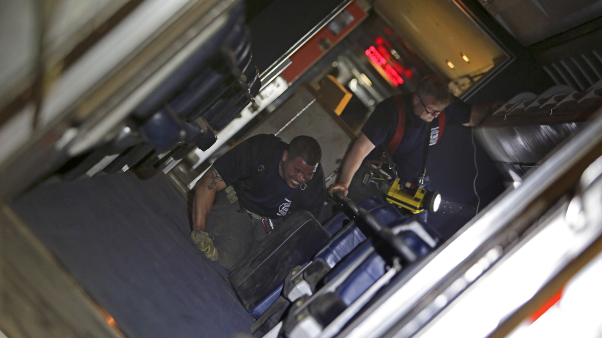  Emergency personnel work the scene of a train wreck, Tuesday, May 12, 2015, in Philadelphia. An Amtrak train headed to New York City derailed and crashed in Philadelphia. (Joseph Kaczmarek/AP Photo)  
