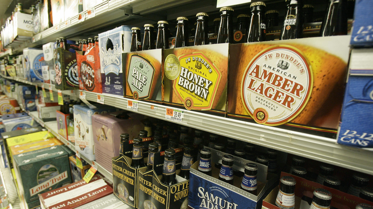  Various beer brands line store shelves. (Toby Talbot/AP Photo) 
