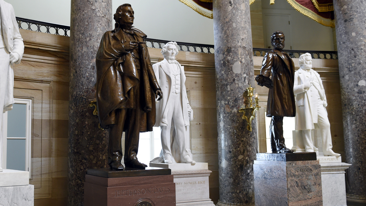  A statue of Jefferson Davis, (left), is on display in Statuary Hall on Capitol Hill in Washington, Wednesday, June 24, 2015. The statue was given to the National Statuary Hall Collection in the U.S. Capitol by Mississippi in 1931. Davis served the nation in many positions before being appointed president of the Confederate States during the Civil War, including Secretary of War, a member of the U.S. House of Representatives and a member of the U.S. Senate.  (Susan Walsh/AP Photo) 
