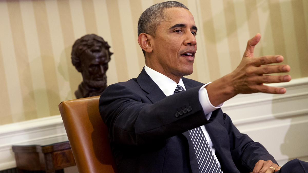  President Barack Obama speaks to the media during a meeting with Secretary of Defense Ash Carter in the Oval Office of the White House, Tuesday, Feb. 17, 2015, in Washington. The President spoke about issues including immigration and ISIS. (Jacquelyn Martin/AP Photo) 