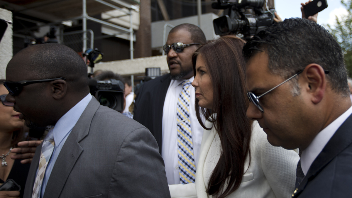  Pennsylvania Attorney General Kathleen Kane arrives to be processed and arraigned on charges she leaked secret grand jury material and then lied about it under oath, Saturday, Aug. 8, 2015, at the Montgomery County detective bureau in Norristown, Pa. (Laurence Kesterson/AP Photo) 