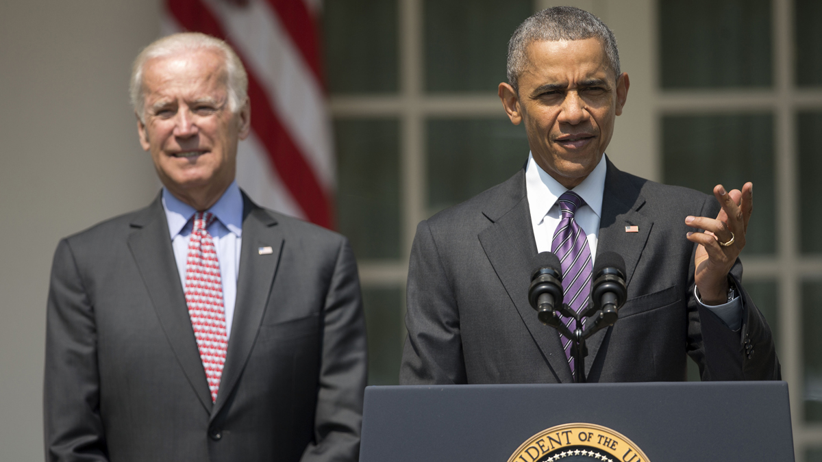  President Barack Obama, accompanied by Vice President Joe Biden, speaks in the Rose Garden of the White House in Washington, Wednesday, July 1, 2015. The president announced that US and Cuba have agreed to open embassies in each other's capitals, the biggest tangible step in the countries' historic bid to restore ties after more than a half-century of hostilities. (Pablo Martinez Monsivais/AP Photo) 