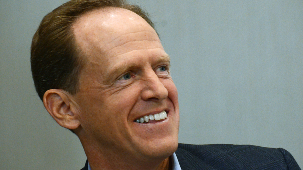  Republican U.S. Sen. Pat Toomey, of Pennsylvania, smiles while being introduced before taking the stage in a suburban Philadelphia hotel ballroom to announce that he is running for a second six-year term in office, Sunday, Sept. 13, 2015, in King of Prussia, Pa. (Marc Levy/AP Photo) 