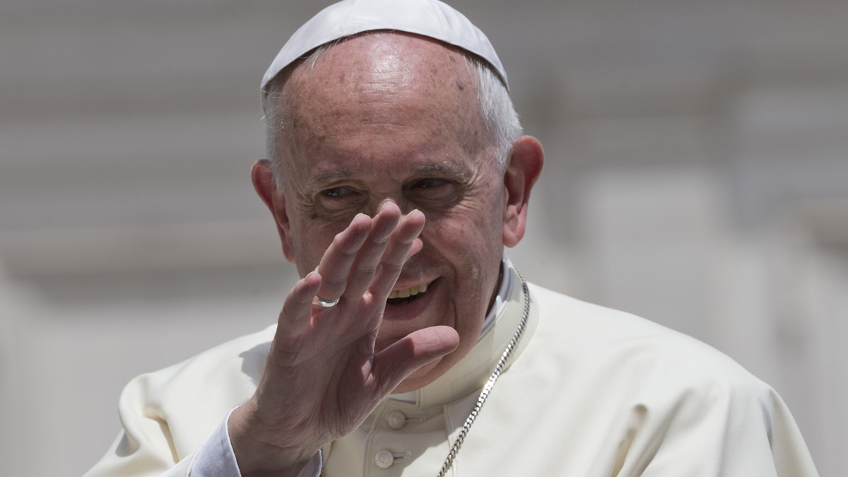  Pope Francis waves as he leaves at the end of his weekly general audience, in St. Peter's Square at the Vatican, Wednesday, June 17, 2015. (Andrew Medichini/AP Photo) 