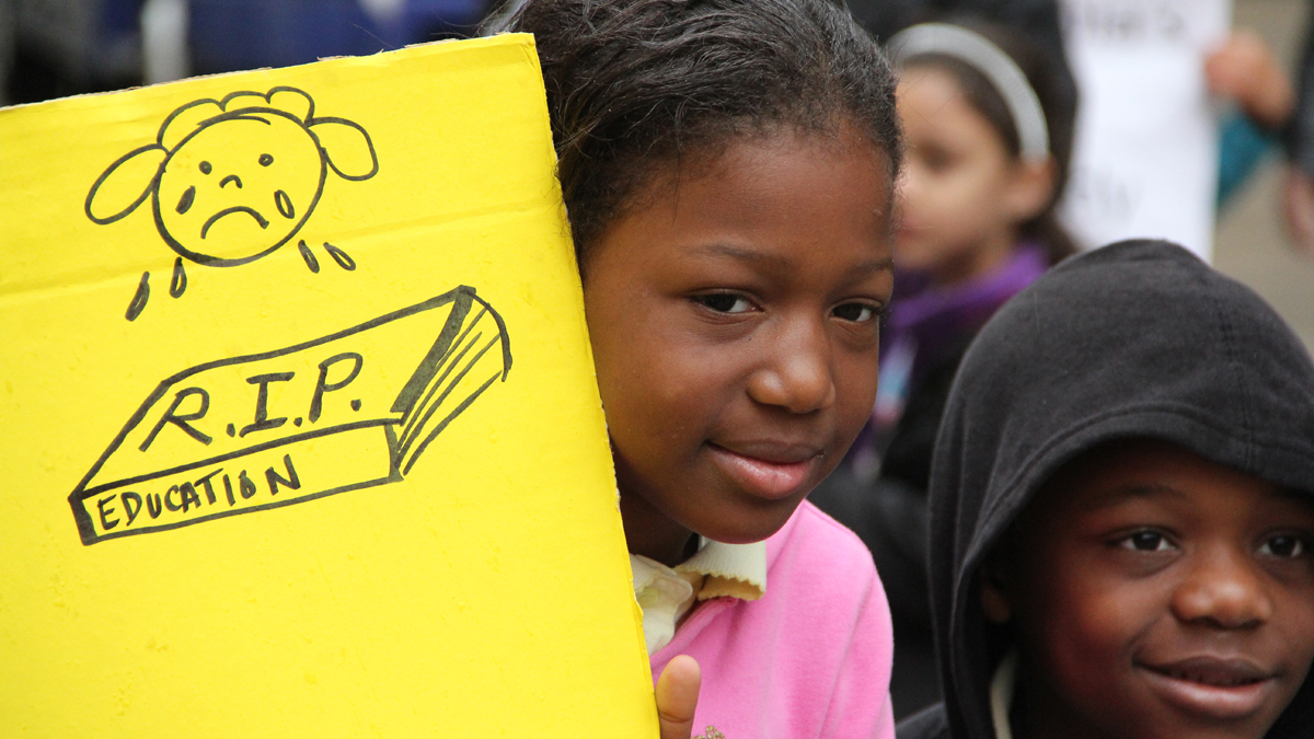  Emani Edwards, 9, and Khyair Goodwin, 7, participate in a protest against school budget cuts at Philadelphia City Hall on April 29, 2013. (Emma Lee/for NewsWorks) 