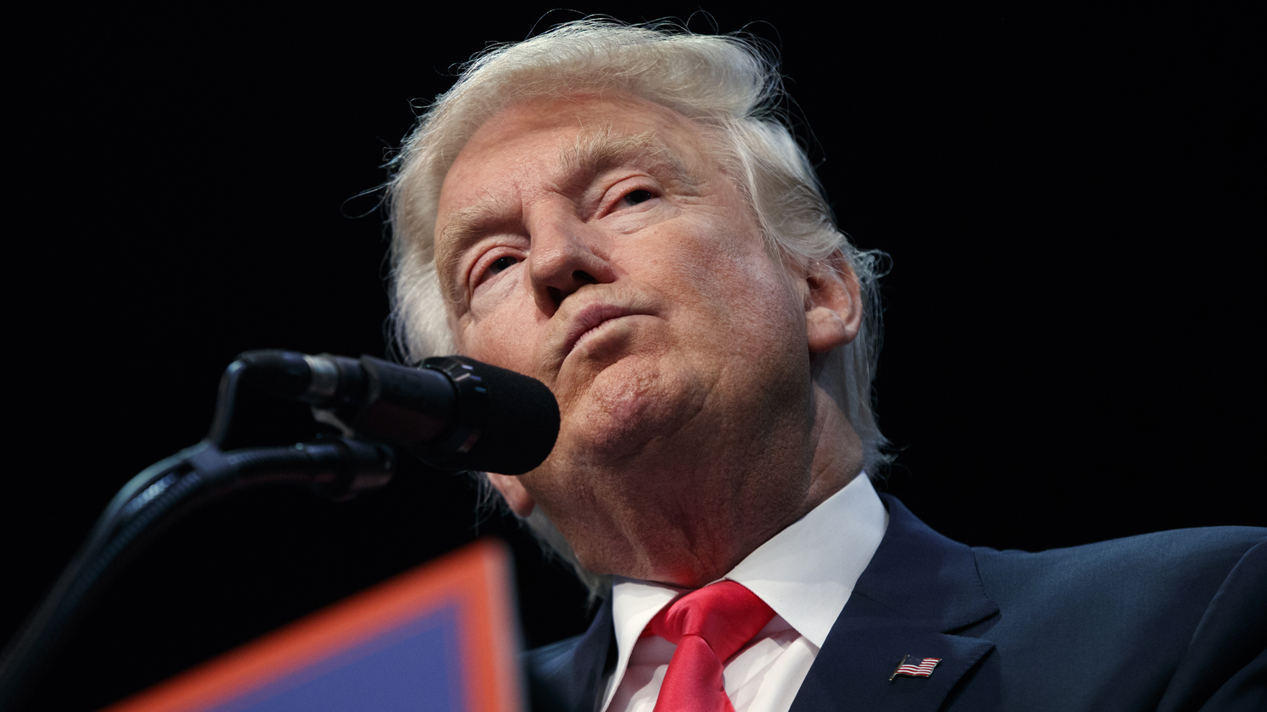Republican presidential candidate Donald Trump pauses while speaking at a campaign town hall at Ocean Center