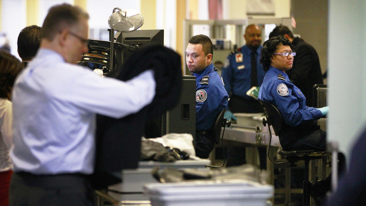 TSA workers are required to work without a paycheck during the shutdown. (WHYY, file)