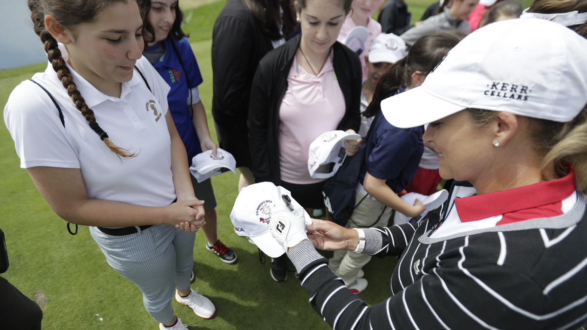  Professional golfer Cristie Kerr, (right), signs autographs during a media event at Trump National Golf Club, which is scheduled to host the U.S. Women's Open Championship, Wednesday, May 24, 2017, in Bedminster, N.J. (Julio Cortez/AP Photo) 