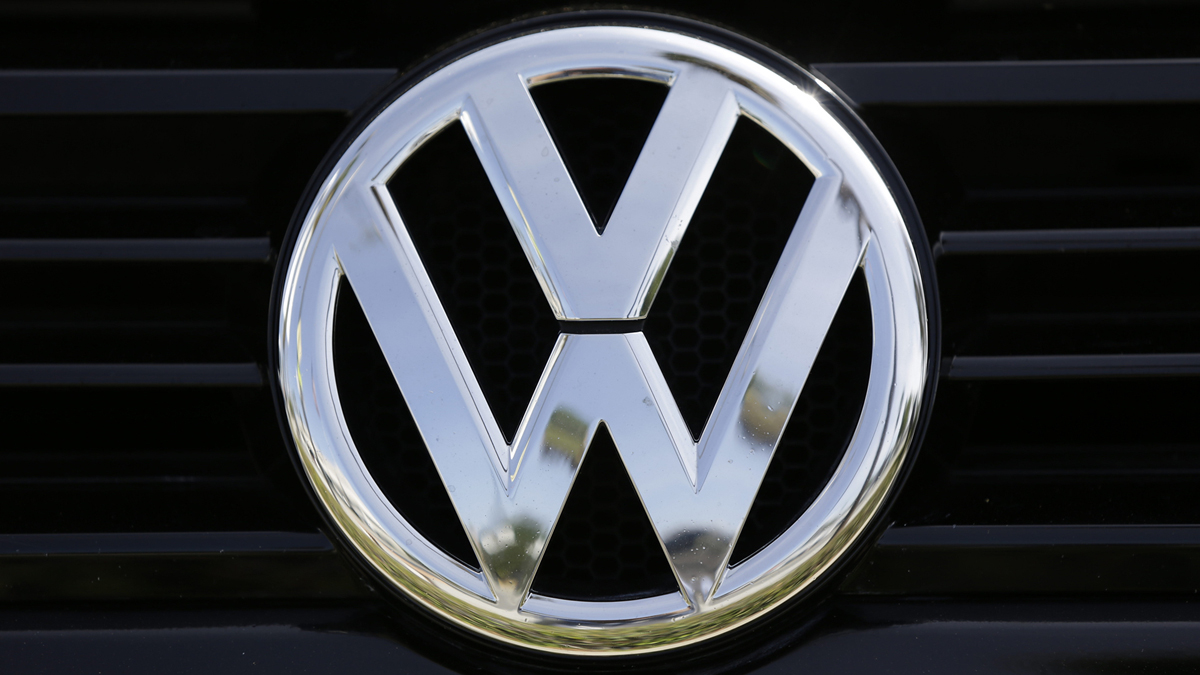  In this Sept. 21, 2015, file photo, a Volkswagen logo is seen on car offered for sale at New Century Volkswagen dealership in Glendale, Calif. (Damian Dovarganes/AP Photo, File) 