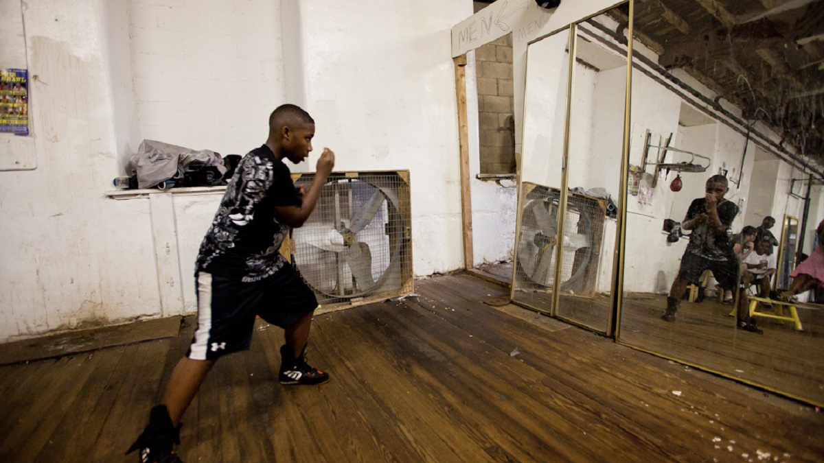 James Barnett warms up for a day of training at Bozy's Dungeon boxing gym in East Germantown. (Brad Larrison/for NewsWorks) 