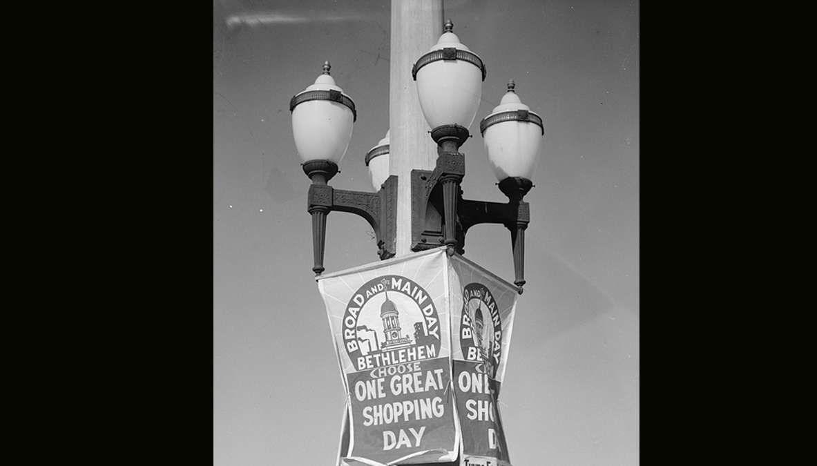 Advertisement of Main Street shopping. Photograph by Walker Evans circa November 1935. (Library of Congress)