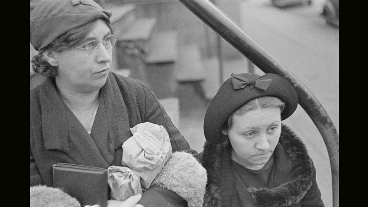 Bystanders sitting on a stoop in  Bethlehem, Pa.  Photograph by Walker Evans circa March 1936.  (Library of Congress)