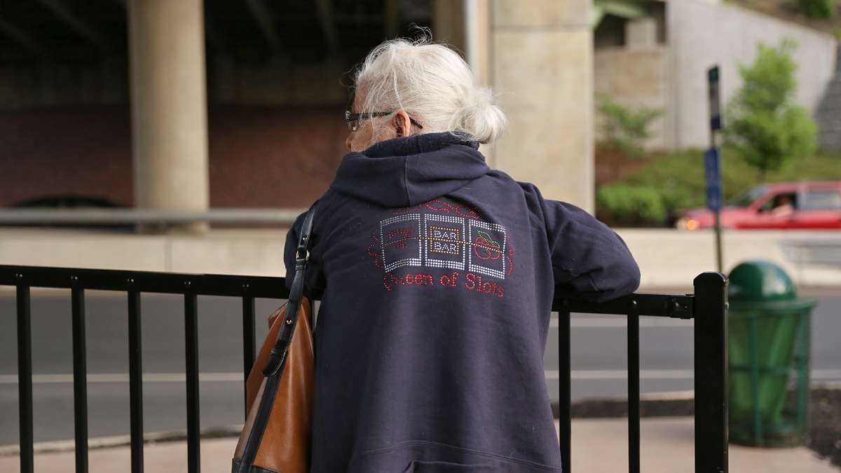 Jean Barber, 75, waits for a bus outside the Sands Resort Casino in Bethlehem, Pa. Barber said she use to travel to Atlantic City, N.J. to gamble and prefers the convenience of the Sands at the former steel plant where her mother and father worked. (Lindsay Lazarski/WHYY)