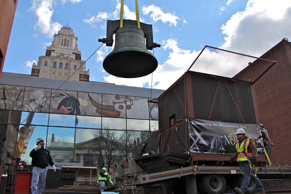 <p>The Bicentennial Bell, is lowered into a crate for storage. The bell will returned to the Independence National Historical Park when a new display is completed. (Emma Lee/for NewsWorks)</p>
