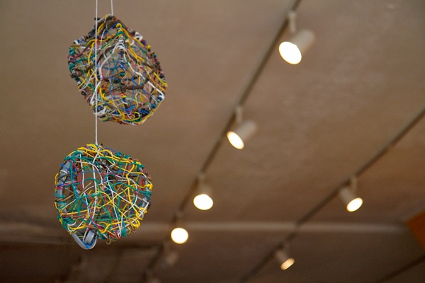 <p><p>Toss rifts off of the sight of sneakers hanging from telephone wires and power lines. Instead of sneaker the designers "toss" or hang birdhouses. (Lindsay Lazarski/WHYY)</p></p>
