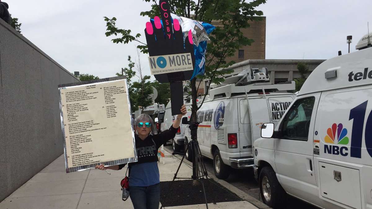 Artist Bird Milliken circles the Montgomery County Courthouse with a musical protest, featuring Helen Reddy's anthem 'I am Woman,' to support Bill Cosby's accusers, and victims of sexual abuse.