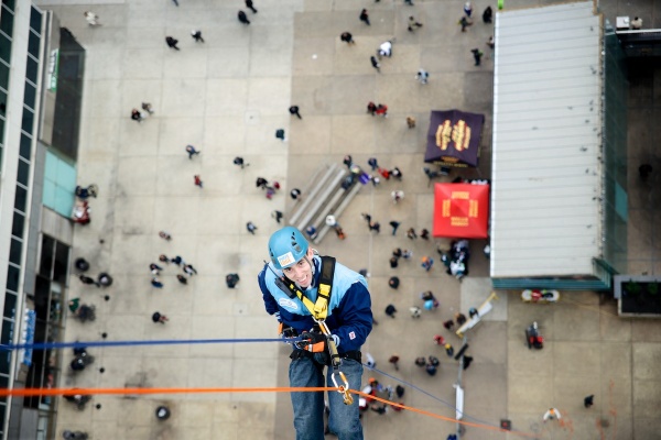 <p><p>People look tiny below Matt Fingerman. (Bas Slabbers/for NewsWorks)</p></p>
