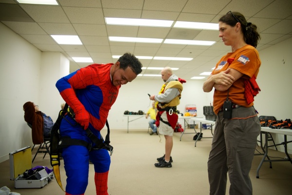 <p><p>Fernando Ezhevrry suits up in a Spiderman costume before rappeling down the building. (Bas Slabbers/for NewsWorks)</p></p>
