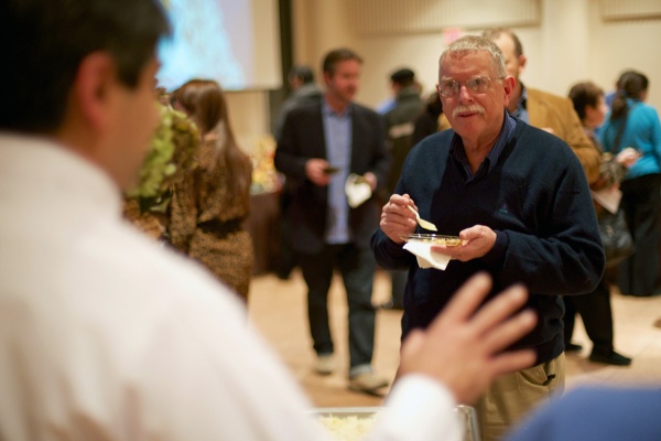 <p><p>Bob Hensil listens to MAUSA's Executive Director Anuj Gupta. Gupta served up a Keema Curry. (Bas Slabbers/for NewsWorks)</p></p>
