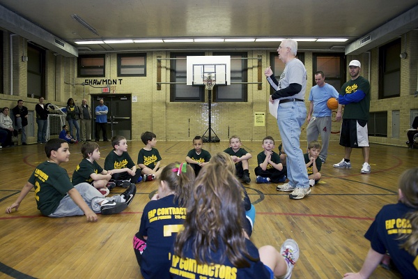 <p><p>The teams sit down before the game for a welcome back speech. (Bas Slabbers/for NewsWorks)</p></p>
