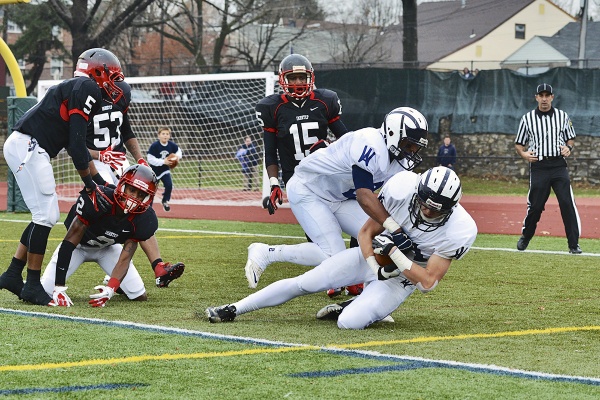 <p><p>Four Panthers look on as the Spartans celebrate another touchdown. (Bas Slabbers/for NewsWorks)</p></p>
