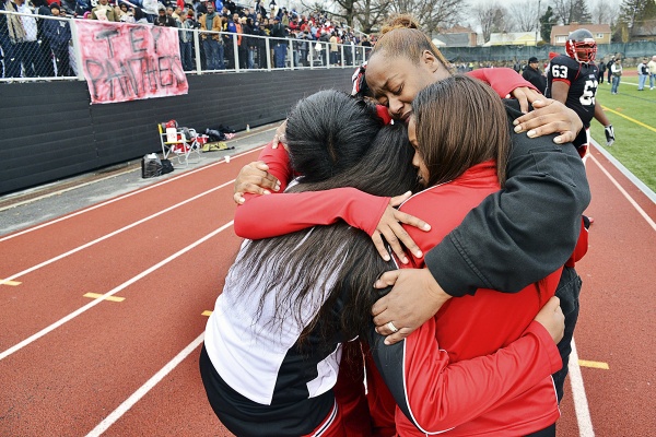 <p><p>The Imhotep Panthers cheerleaders support one another in defeat. (Bas Slabbers/for NewsWorks)</p></p>
