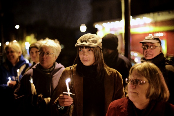 <p>Vicky Miles (middle) from East Falls says that children need education to have a fighting change in this world. (Bas Slabbers/for NewsWorks)</p>
