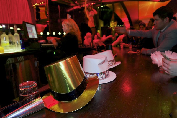 <p><p>New Year hats lay on the bar of the Burlesque area. (Bas Slabbers/for NewsWorks)</p></p>
