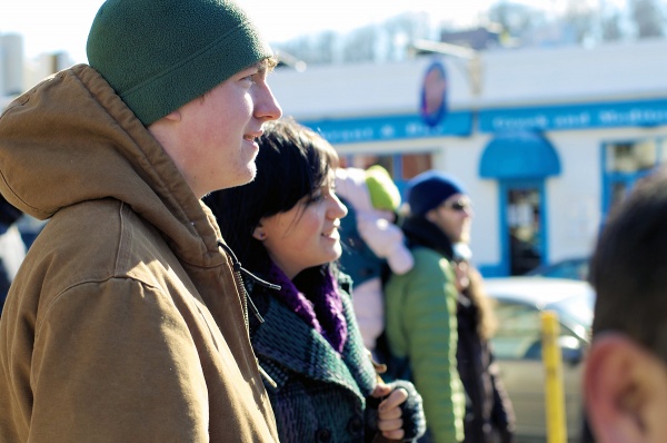 <p><p>Matthew McKenna and Alyssa Emig watch one of the carvers at work. (Bas Slabbers/for NewsWorks)</p></p>
