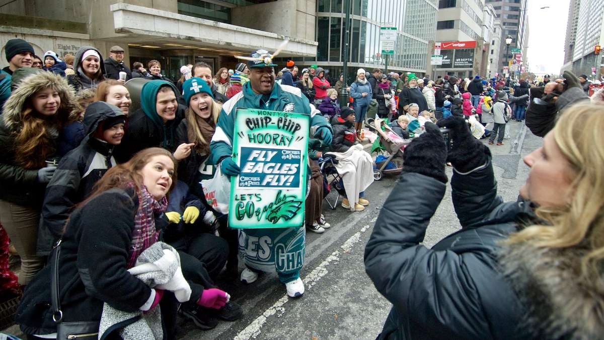 Crowds of people line the parade route at the 95th annual Thanksgiving Day Parade. (Bas Slabbers/for NewsWorks)