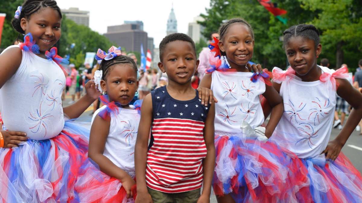 Lanaya, 10, Azuri, 3, Kaleem, 5, Kashae, 8, and Adriana, 10, pose for a photo to show off their festive attire.