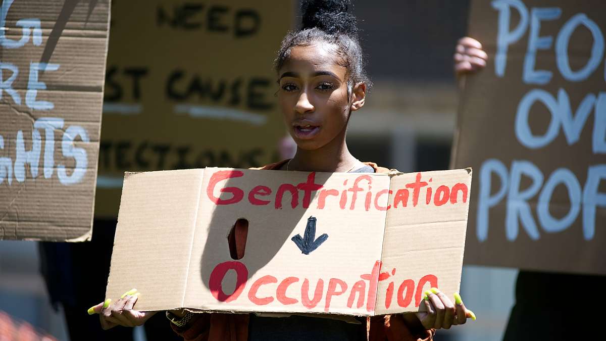 During a rally on Wednesday residents of Penn Wynn House apartment building protest an imminent mass-eviction after the property changed hands recently.