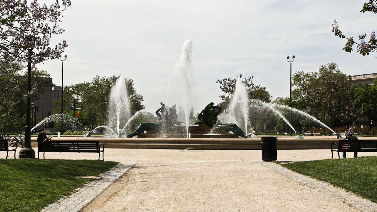 The Swann Memorial Fountain was named for Dr. Wilson Cary Swann, the founder and president of the Philadelphia Fountain Society, which provided fresh drinking water throughout the city. The three reclining figures represent Philadelphia's three main waterways: the Delaware and Schuylkill Rivers and Wissahickon Creek. (Kimberly Paynter/WHYY)