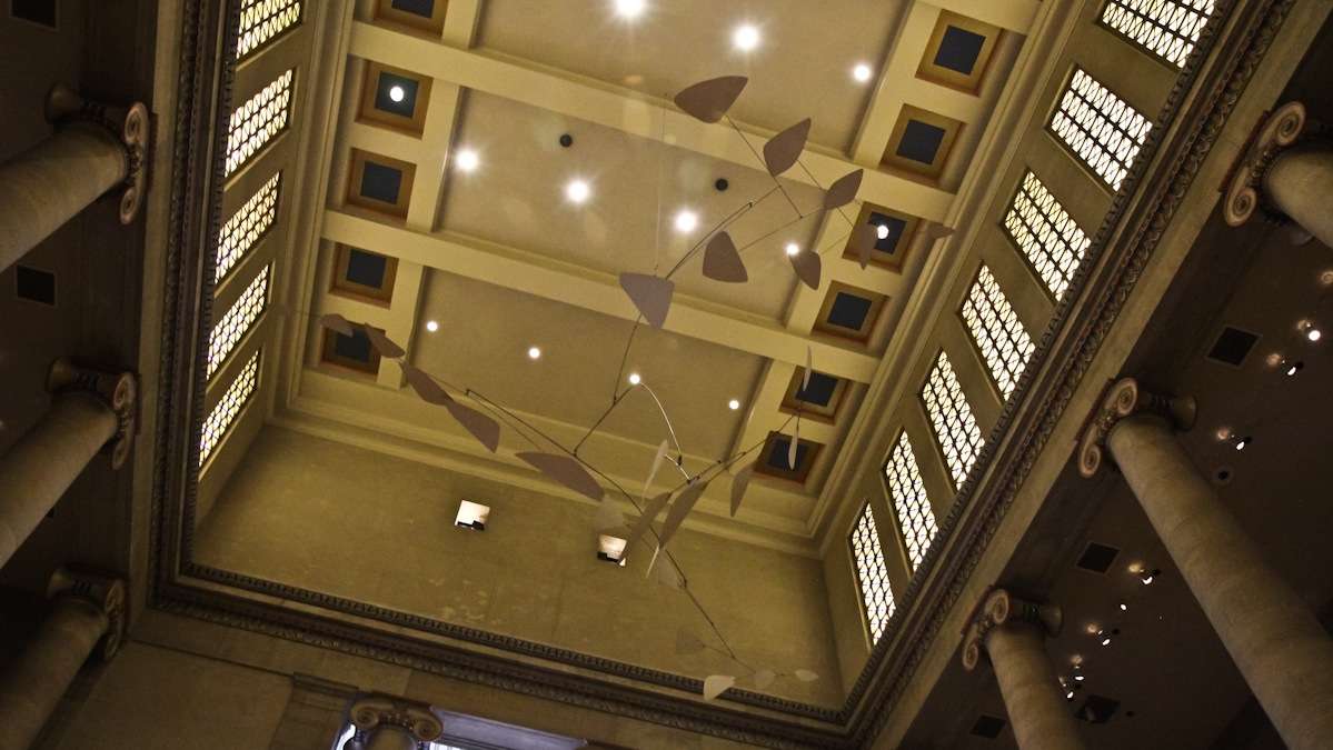 The mobile 'Ghost' hangs in the Great Stair Hall of the Philadelphia Museum of Art. (Kimberly Paynter/WHYY)