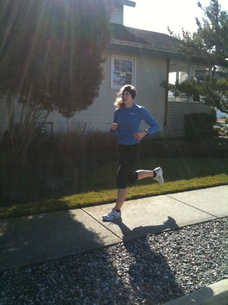 Alison Stuart finishes her leg of the Cape 2 Gate relay in Avalon. (Jen A. Miller/for NewsWorks)