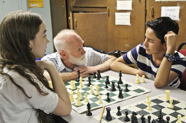 Masterman chess coach Stephen Shutt instructs members of the Masterman Chess Club.