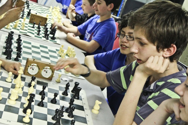Eighth grade student Alexander Wlezien (right) Took home second place for individual competition in his age group.