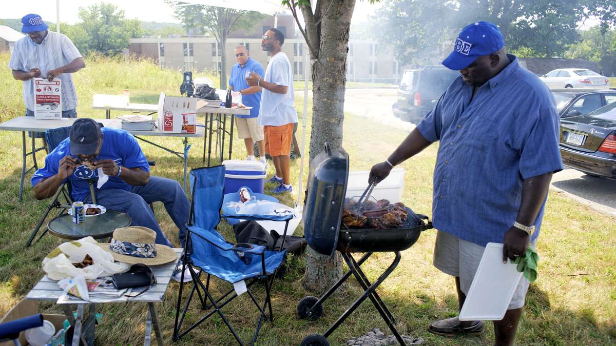 Cheney University alumni take part in a tailgating party ahead of the 'Battle of the Firsts' football game between the Cheyney Wolves and Lincoln University Lions, in September at the Cheyney campus. (Bastiaan Slabbers/for NewsWorks)