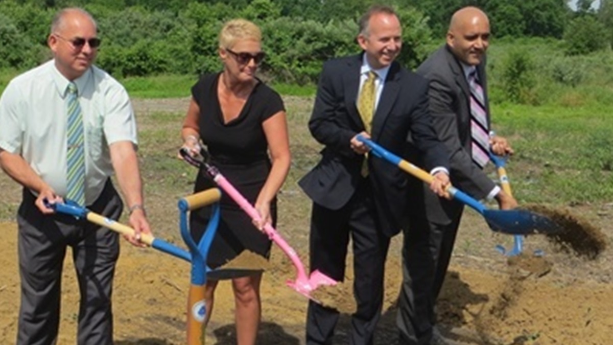  Jennifer Cohan, seen here holding a pink shovel during a DMV groundbreaking ceremony in June 2013, has been nominated to be DelDOT's next secretary. (Mark Eichmann/WHYY) 