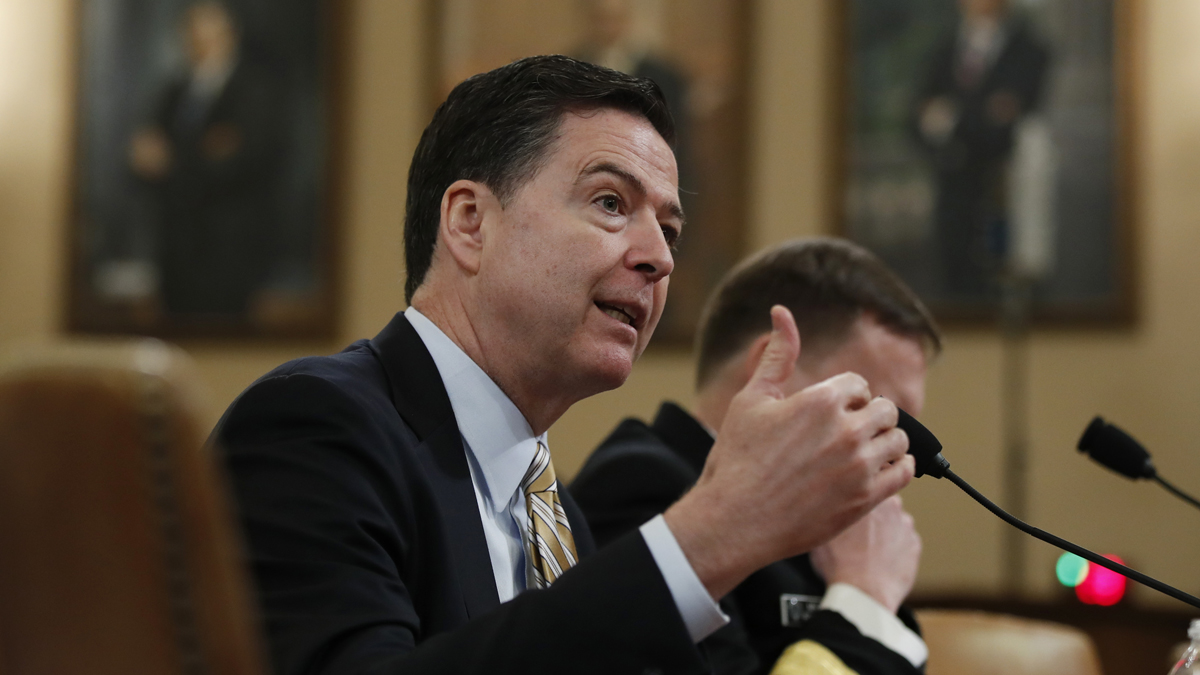  FBI Director James Comey, left, joined by National Security Agency Director Michael Rogers, right, testifies on Capitol Hill in Washington, Monday, March 20, 2017, before the House Intelligence Committee hearing on allegations of Russian interference in the 2016 U.S. presidential election. (AP Photo/Manuel Balce Ceneta)       