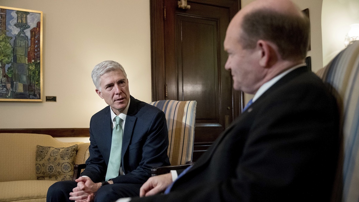  Supreme Court Justice nominee Neil Gorsuch, left, meets with Sen. Chris Coons, D-Del. on Capitol Hill in Washington, Tuesday in February. (AP Photo/Andrew Harnik) 