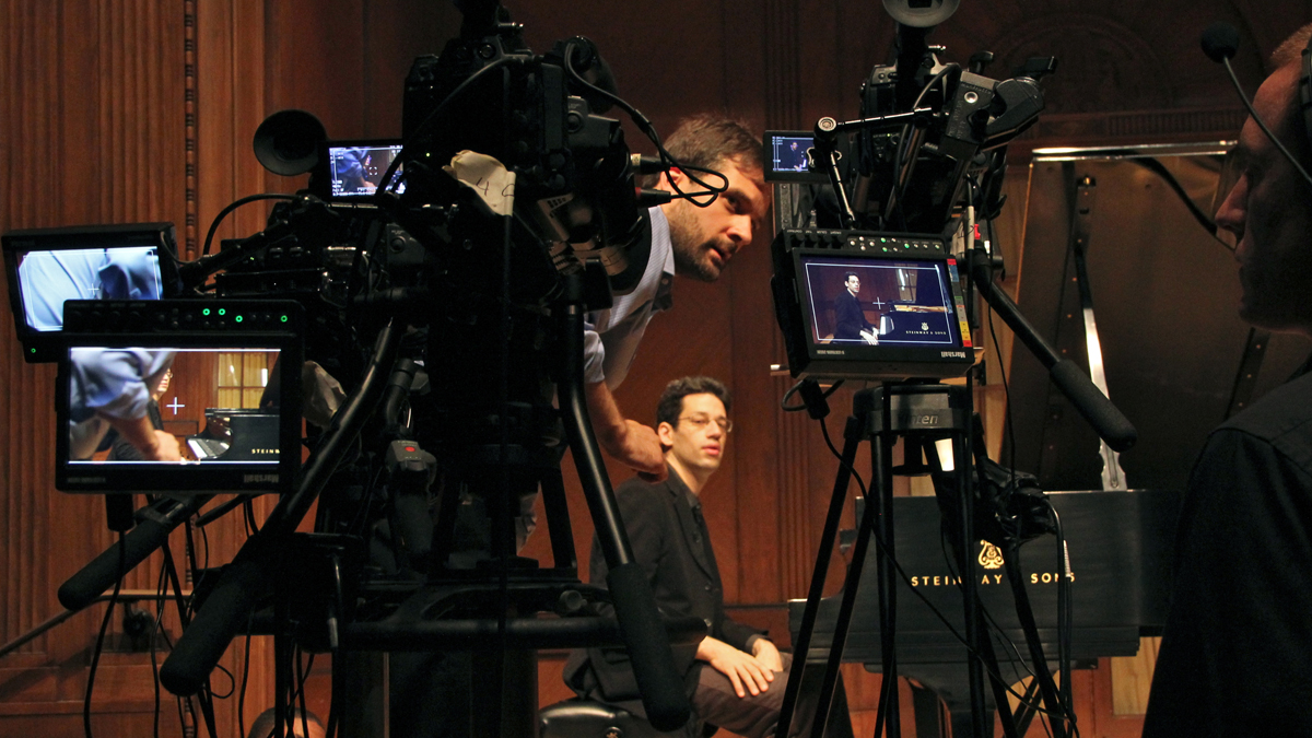 Director/producer Greg Sharrow fine tunes the placement of the three cameras he is using to make the Curtis Institute's first free online course, Exploring Beethoven's Sonatas with Jonathan Biss. (Emma Lee/for NewsWorks)