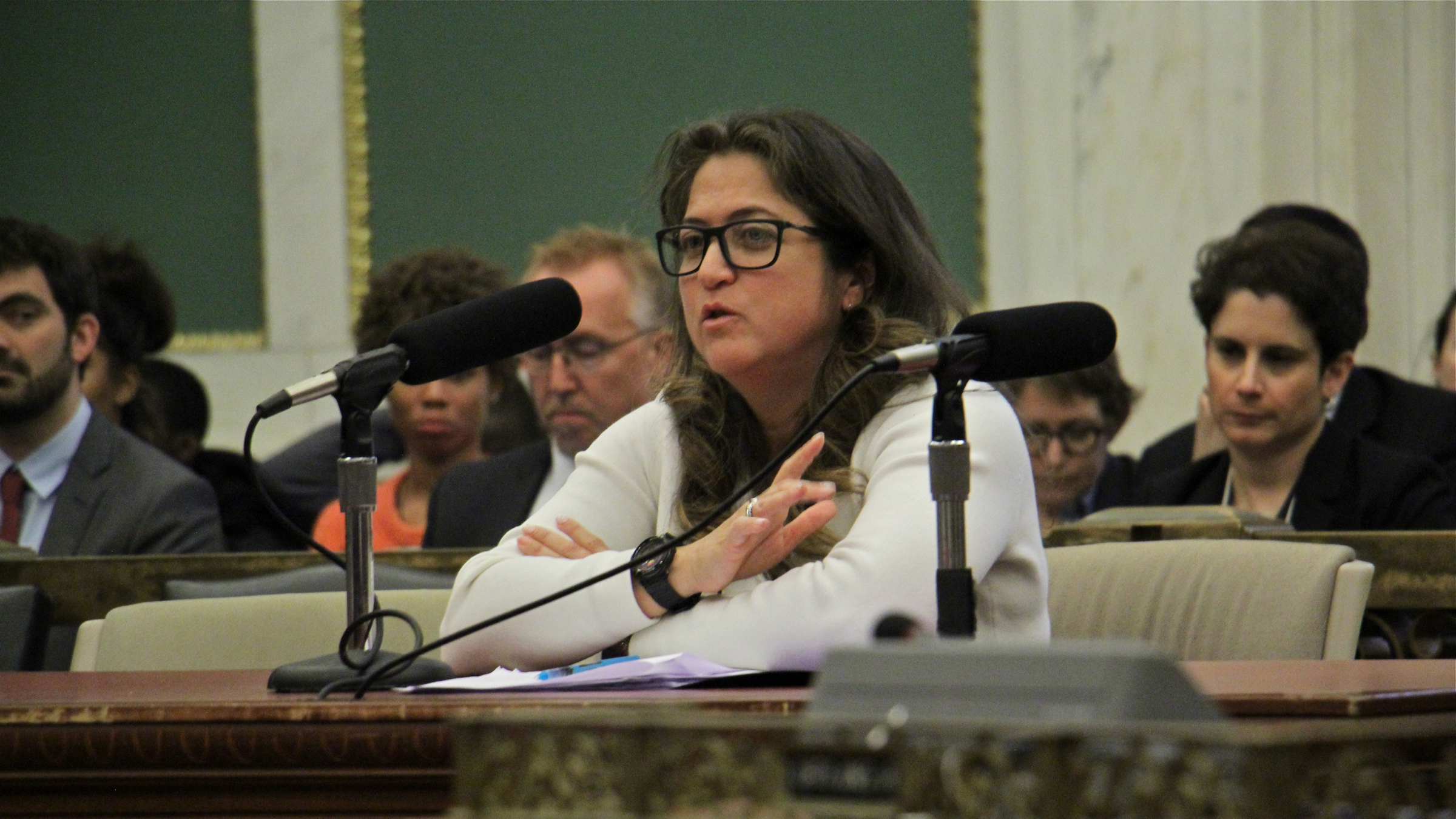  Cynthia Figueroa, commissioner of the Philadelphia Department of Human Services, testifies during a City Council hearing about the detriment of collecting the costs of juvenile confinement from parents and guardians. (Emma Lee/WHYY) 
