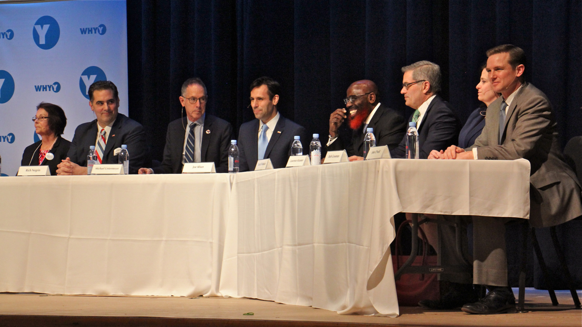  The eight candidates for Philadelphia district attorney (from left) Teresa Carr Deni, Rich Negron, Michael Untermeyer, Joe Khan, Tariq El-Shabazz, Larry Krasner, Beth Grossman, and Jack O'Neill, debate at Springside Chestnut Hill Academy.  (Emma Lee/WHYY) 