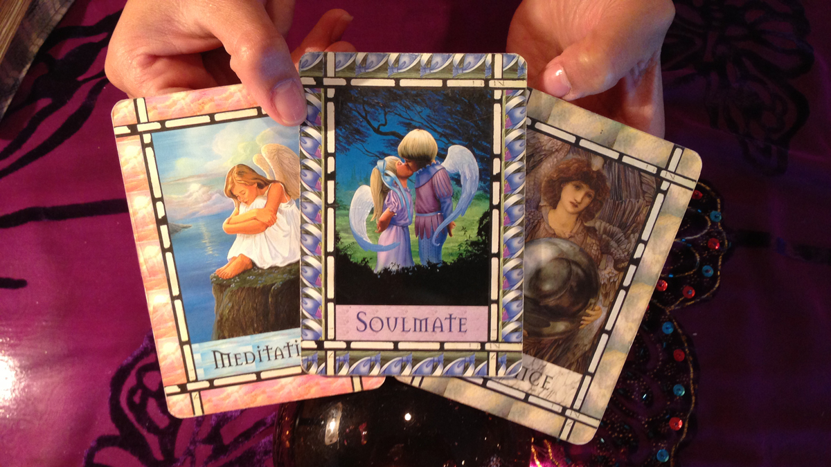  Dinah Wanko, of New Age Psychic Boutique in Llanerch, Pa., is shown holding tarot cards. (Image courtesy of Shawn McGill.) 