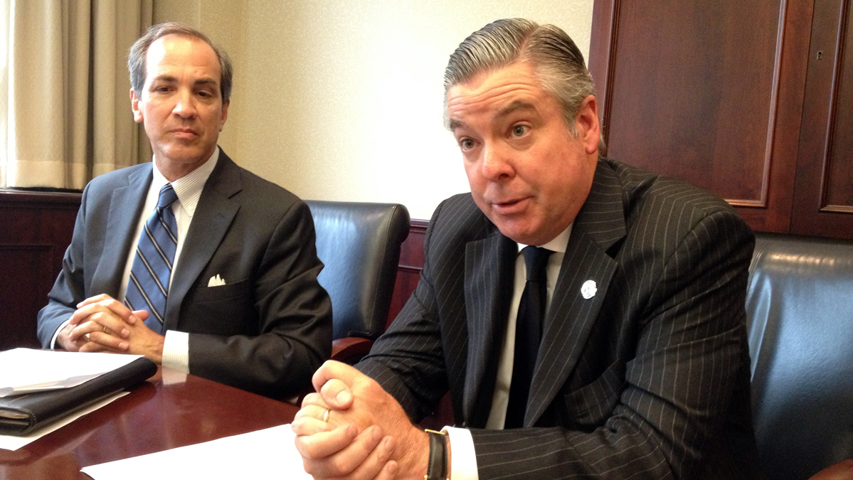  From left: Keith Orris, Drexel's senior vice president for corporate partnerships, and John Fry, Drexel president. (Zack Seward/WHYY) 