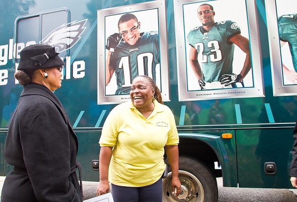 <p><p>Wister School Principal Donna Smith shows her gratitude to the president of the Independence Blue Cross Foundation, Lorina L. Marshall Blake, outside of the Eagles Eye Mobile on Tuesday. (Brad Larrison/For NewsWorks)</p></p>
